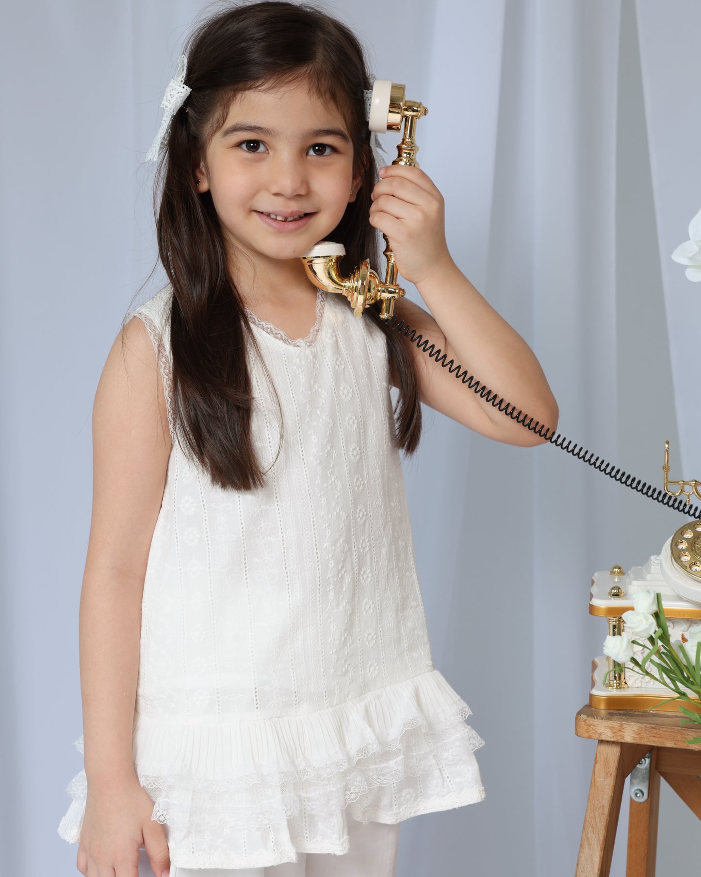 White sleeveless top