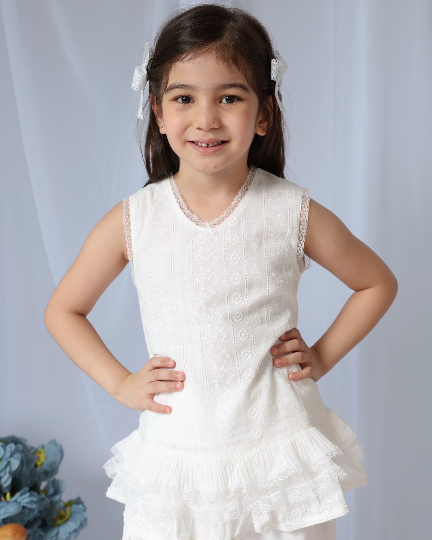 White sleeveless top