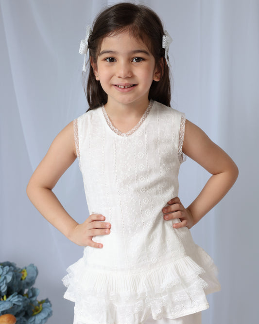 White sleeveless top